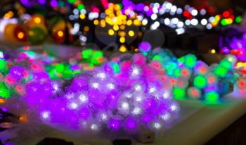 Christmas decoration lights, bright xmas garland closeup, new year. Winter holiday celebration