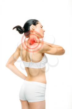 Joint pain, woman have problem with neck, pinched nerve, white background. Female person in white lingerie, back view, medical advertising or concept 