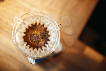 Glass coffee pot with membrane closeup, top view, nobody. Aroma espresso preparation, barista occupation