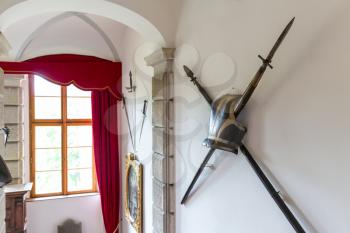 The hall of trophies, exhibits on the wall, Europe. Medieval european weapons, famous places for travel and tourism