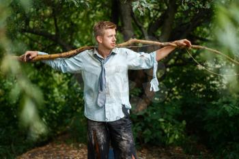 Alone businessman with homemade fishing rod on lost island. Business risk, collapse or bankruptcy concept