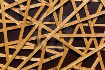Abstract wooden stick pattern isolated on brown background. Wood splinter backdrop or wallpaper