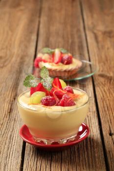 Bowl of creamy pudding with fresh fruit 
