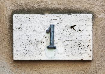 Block number on a weathered wall - detail