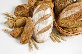 Variety of brown bread and rolls - studio