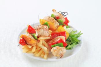 Chicken Shish kebabs with French fries