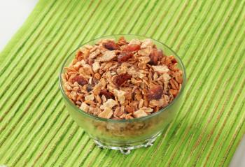 Bowl of mixed breakfast cereals and dried fruit