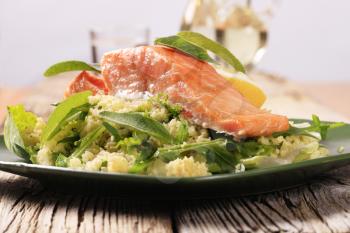 Slow roasted salmon fillet on a bed of couscous salad 