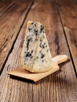 Blue cheese on a wooden serving board
