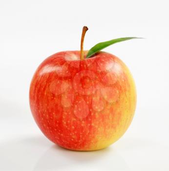 Ripe red apple with glossy skin - studio