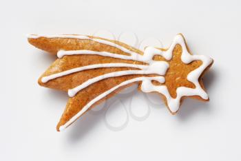 Gingerbread cookie in the shape of a comet

