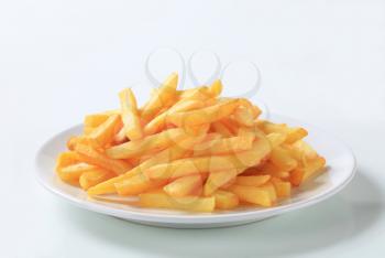 Serving of French fries on a plate