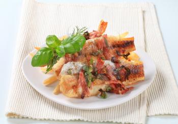Pan fried fish fillets with French fries