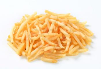 Fresh fried French fries - studio shot