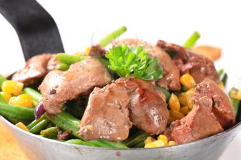 Pan-fried chicken livers with green beans and sweetcorn