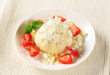 Strawberry dumpling with cottage cheese, sugar and butter
