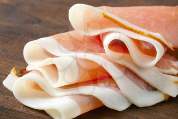 Delicious dry-cured ham sliced paper thin