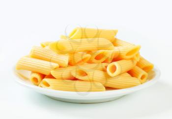 Portion of cooked penne pasta