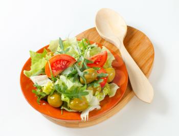 Fresh vegetable salad with green olives