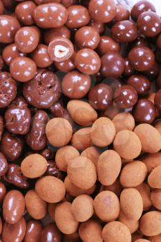 Variety of chocolate covered nuts - detail