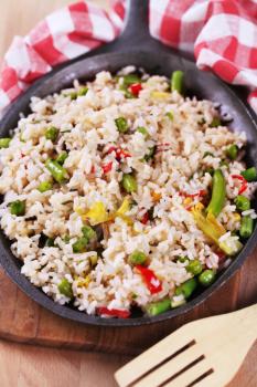 Vegetable fried rice on a frying pan