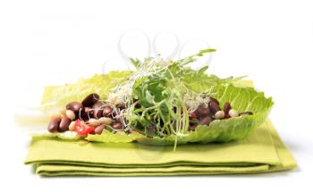 Red beans, sprouts and salad greens in a lettuce leaf 