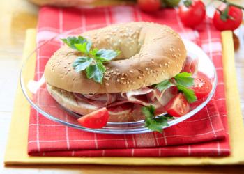 Bagel with thin slices of Parma ham