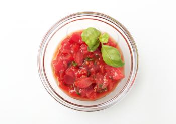 Bowl of peeled tomato salad - studio