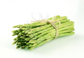 Bunch of fresh asparagus shoots - studio