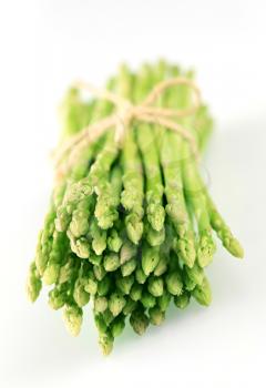 Bundle of Fresh asparagus shoots - studio