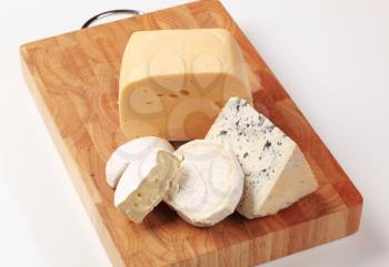 Selection of cheeses on a cutting board