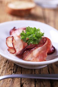 Slices of pan fried bacon