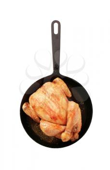 Roast chicken on an iron skillet