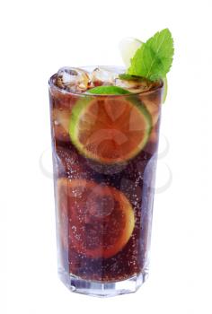 Tall glass of iced drink with slices of lime