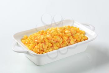 Sweet corn kernels in a porcelain dish 