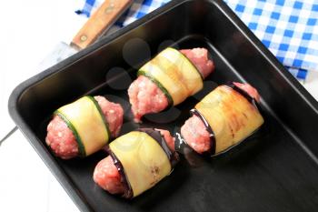 Minced meat wrapped in slices of eggplant and zucchini