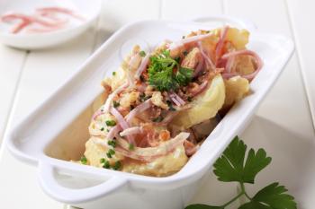 Mustard potato salad with ham and cracklings