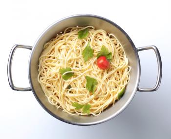 Cooked spaghetti in a colander - overhead