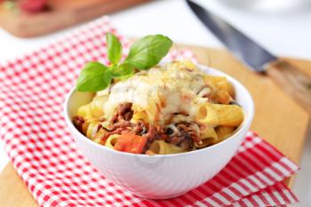 Rigatoni with Bolognese sause and cheese - closeup
