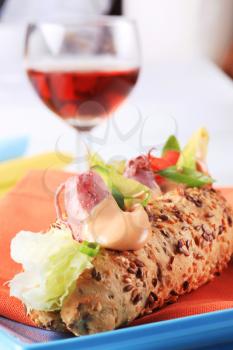 Whole meal submarine sandwich with calamari