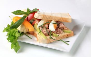 Tuna sandwich with avocado and boiled egg 