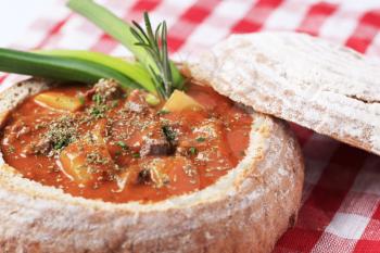 Goulash soup in a bread bowl - detail