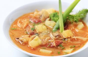 Cabbage soup with potatoes and sausage