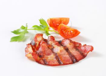 Crispy grilled slice of bacon