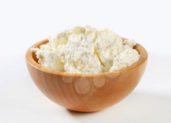 Bowl of white crumbly cheese