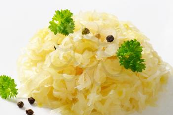 Heap of sauerkraut on white background