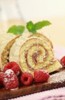 Swiss roll glazed with white chocolate icing