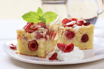 Slices of freshly baked cherry sponge cake 