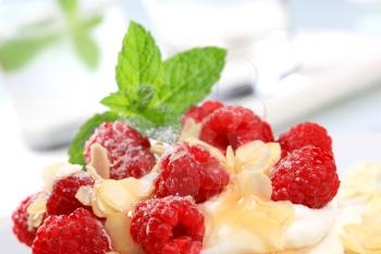 Mascarpone with fresh raspberries and almond chips