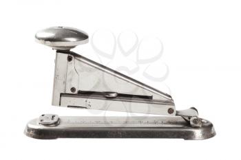 Closeup of an antique stapler isolated on white